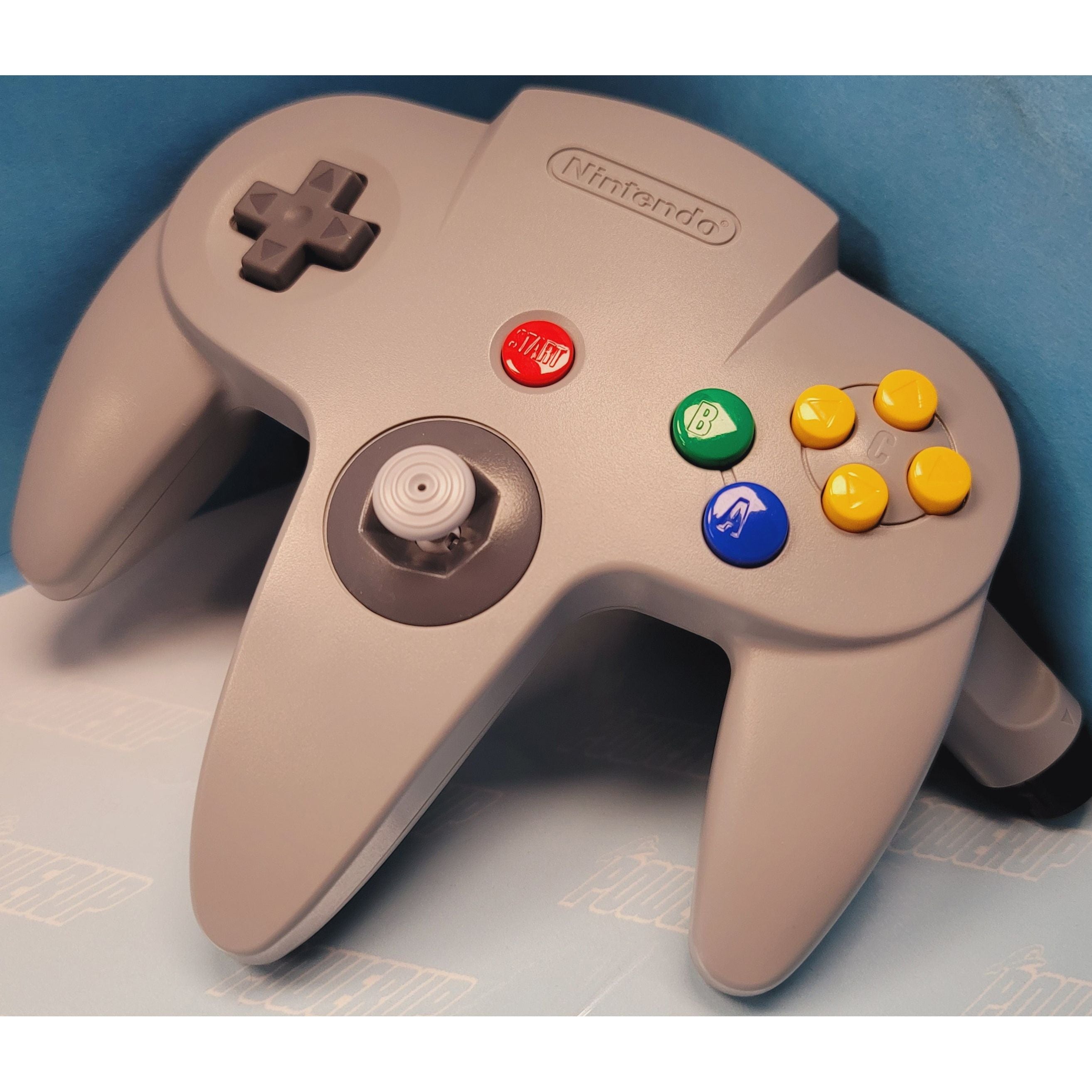 Manette OEM Nintendo 64 complète dans la boîte